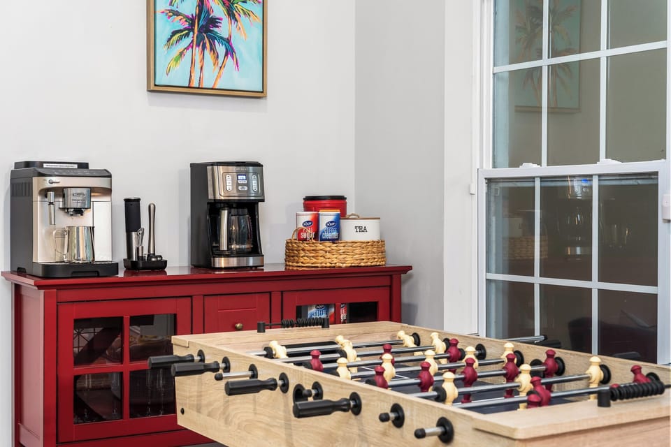 The ultimate game corner—foosball battles and coffee breaks, perfect combination!