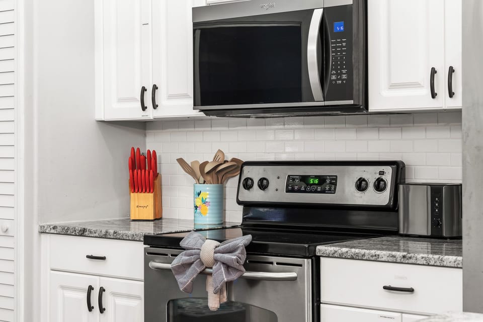Cook with ease in this fully equipped kitchen, designed to prepare family favorites or try something new. From morning coffee to evening meals, this space makes dining in a breeze while keeping everyone connected.