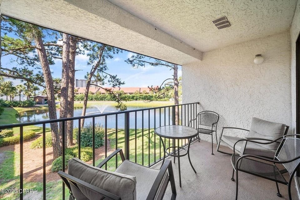 Balcony overlooks a tranquil pond