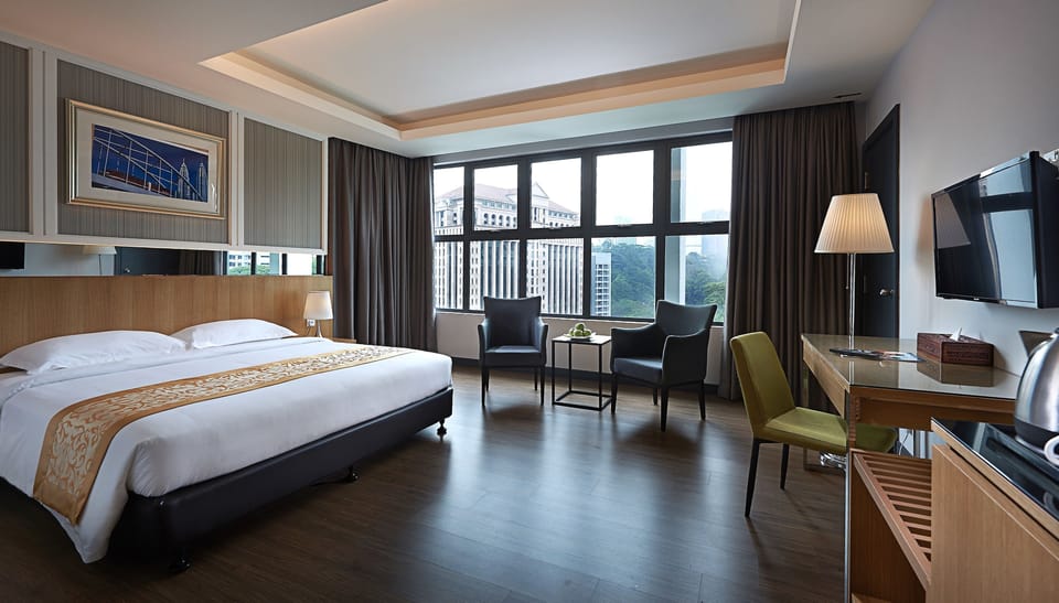 Deluxe Room, 1 King Bed | Minibar, desk, blackout drapes, iron/ironing board