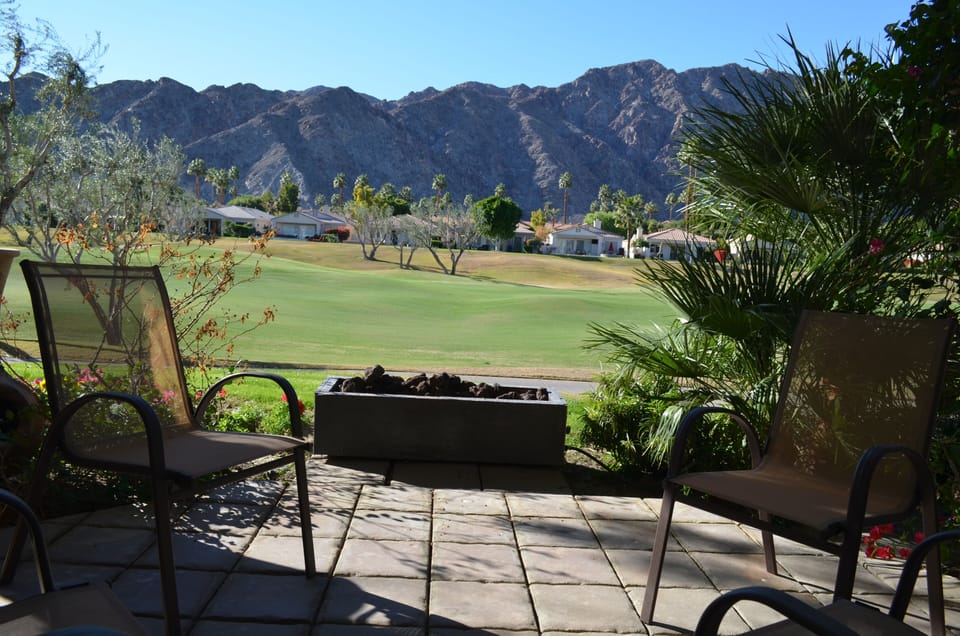 Relax with a beverage, a view and firepit.