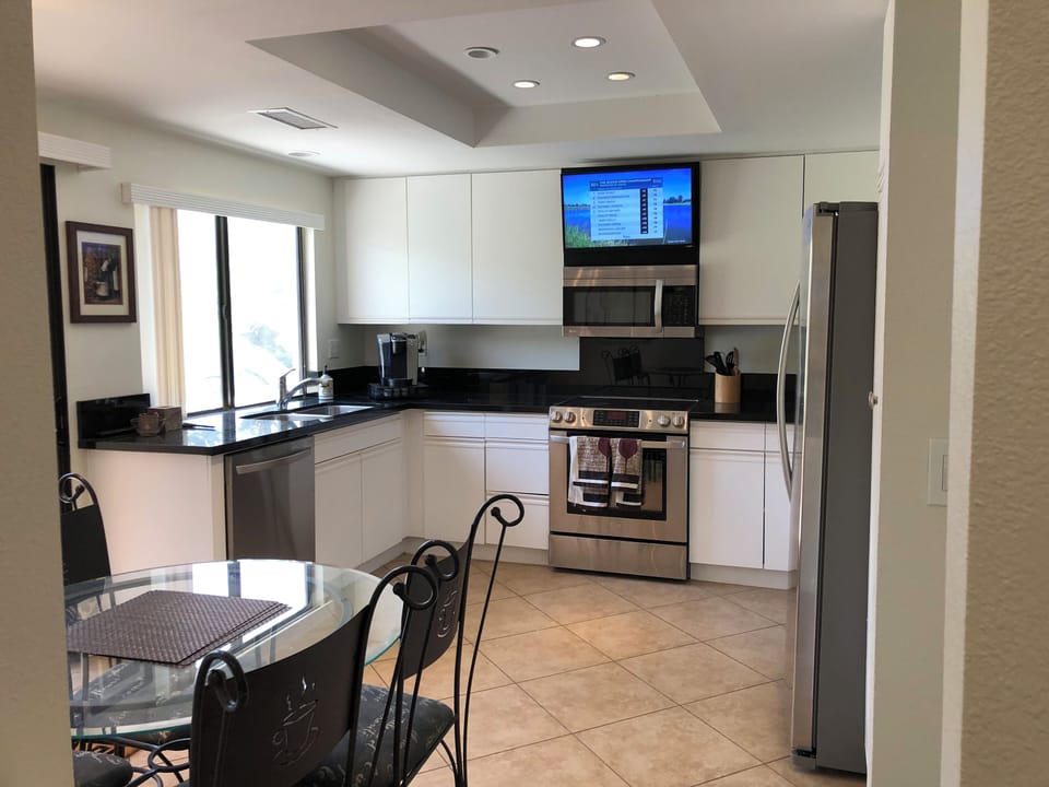 Modern Kitchen Granite, SS Appliances, Pantry, all glasswares, utensils, spices 