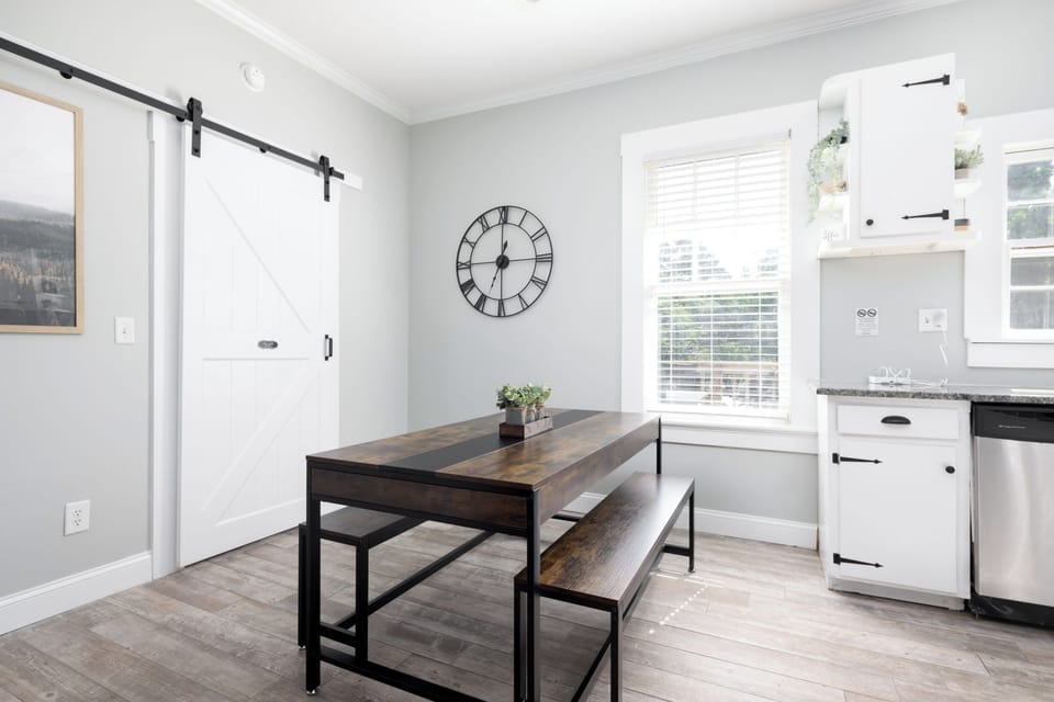 Spacious dining area just off the kitchen, perfect for family meals 