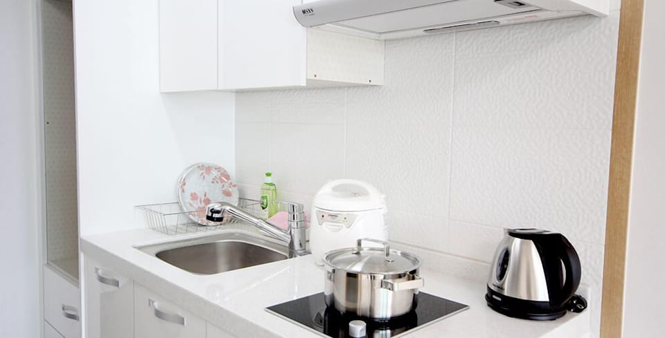 Mini-fridge, electric kettle, cookware/dishes/utensils
