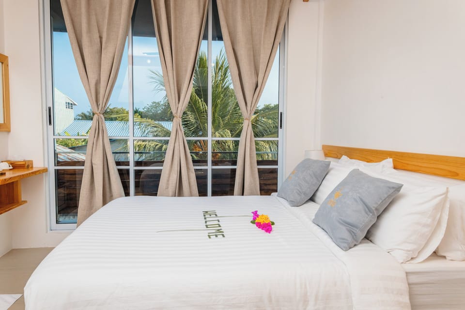 Deluxe Double Room, Balcony | Iron/ironing board, free WiFi, bed sheets