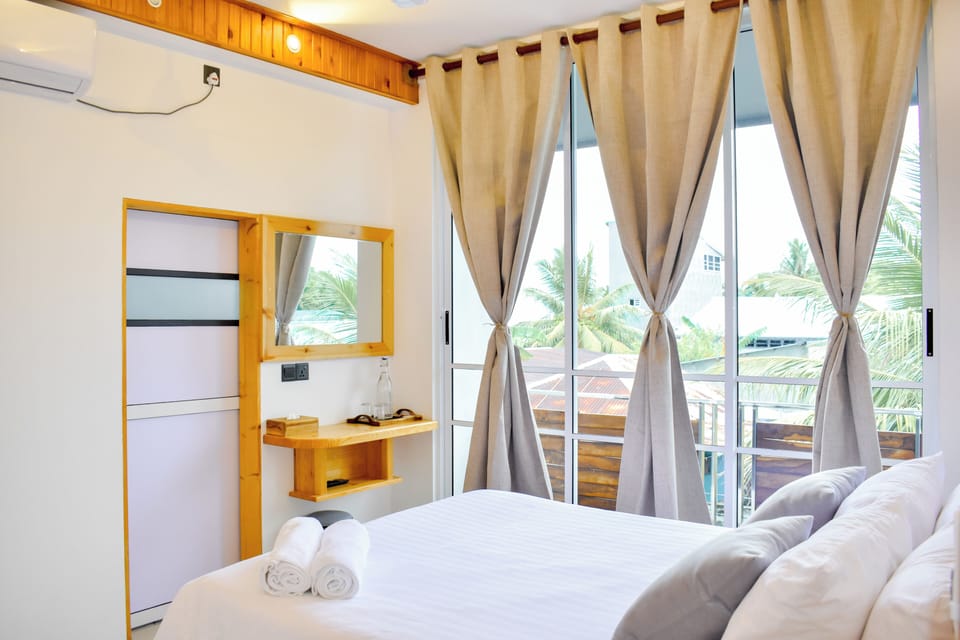 Deluxe Double Room, Balcony | Iron/ironing board, free WiFi, bed sheets