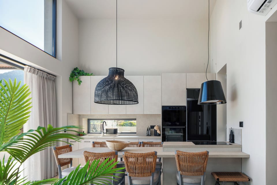 The fully equipped kitchen is a culinary dream, complete with high-quality appliances and everything you need to create a homemade meal.