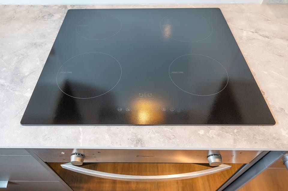 Cook with ease on the modern electric stove, designed for convenience and precision!