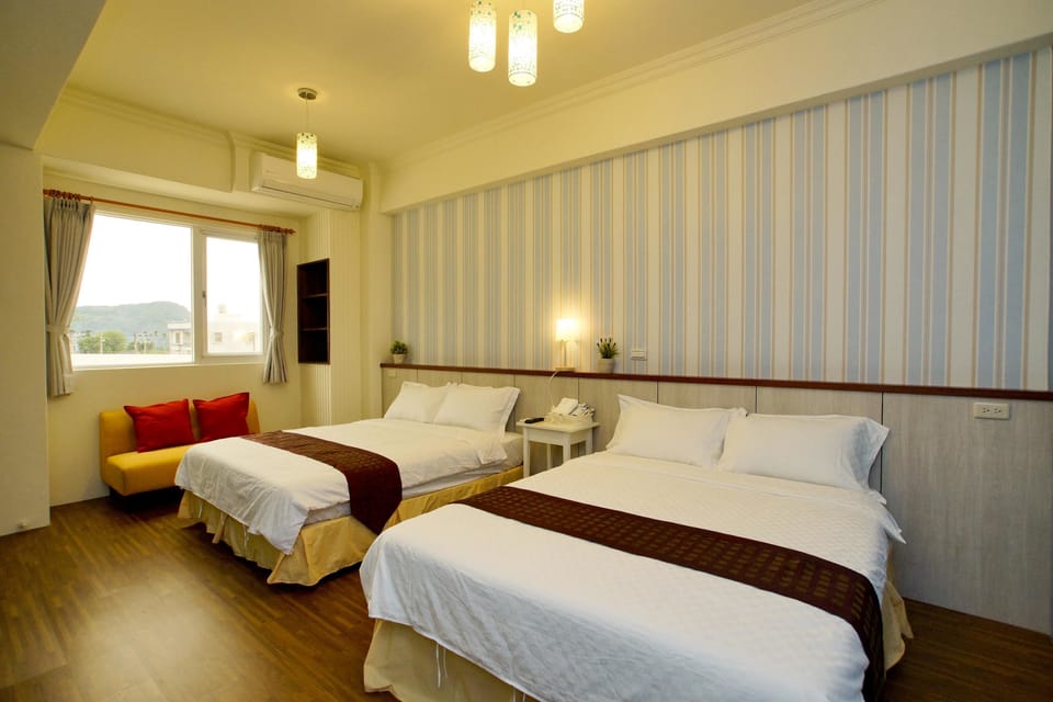 Quadruple Room | Premium bedding, soundproofing, free WiFi