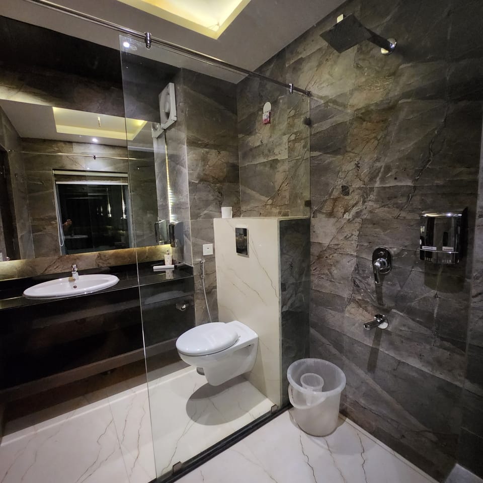 Luxury Room, 1 Double Bed, Mountain View | Bathroom | Shower, rainfall showerhead, hair dryer (on request), slippers