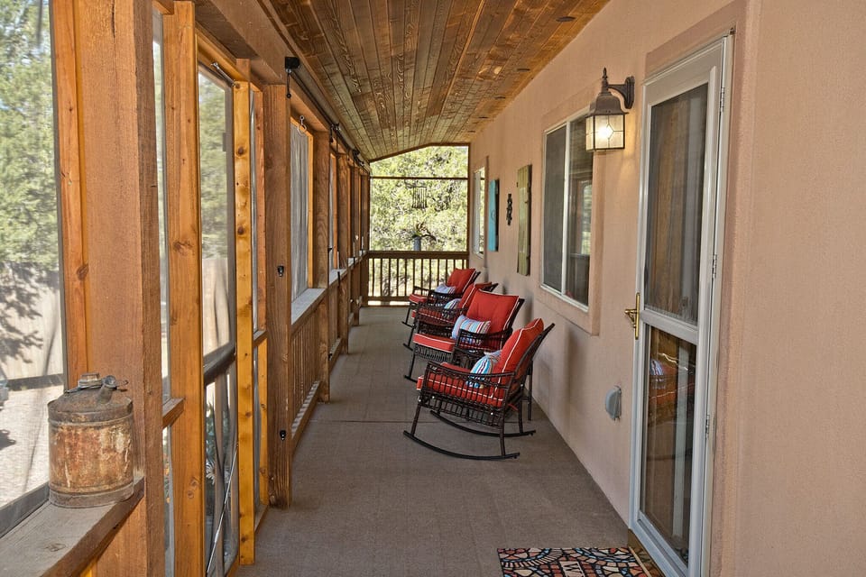 Screened Porch with Rocking Chairs (1)