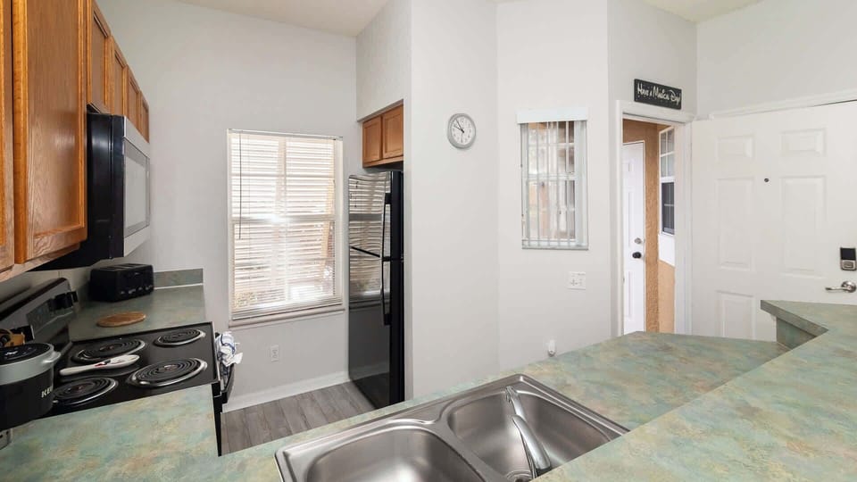 Townhome, Multiple Beds, Patio, Garden View (The Emerald Cove) | Private kitchen | Fridge, microwave, oven, stovetop