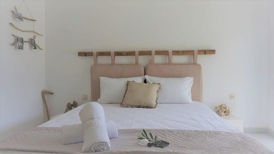 Relax on the Comfy Double Bed in the Peaceful and Minimalist Bedroom