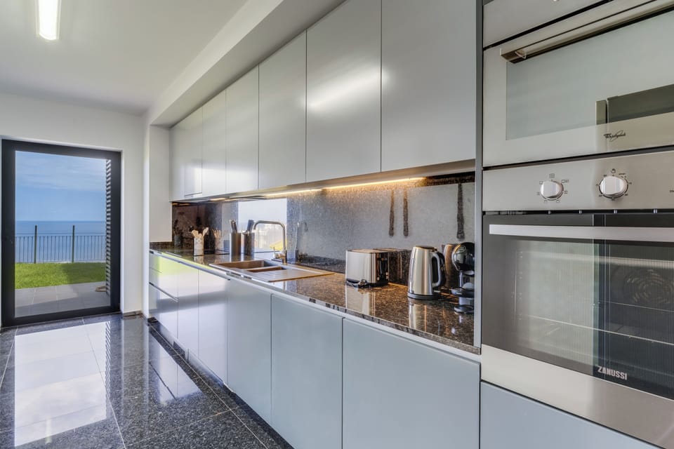 Panoramic Apartment | Private kitchen | Espresso maker, fridge, microwave, oven