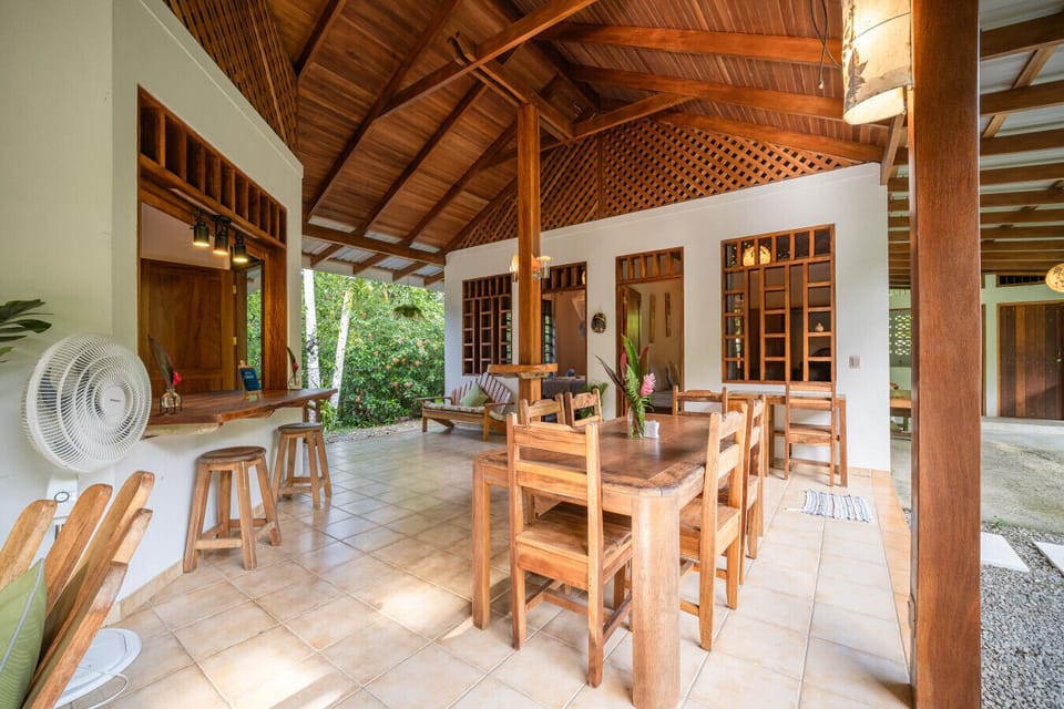 Spacious open-air dining area at Osos Caribeños in Playa Chiquita