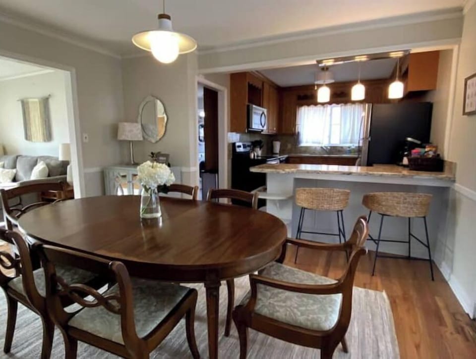 Dining room seats 6 at the table plus two at the kitchen counter. 