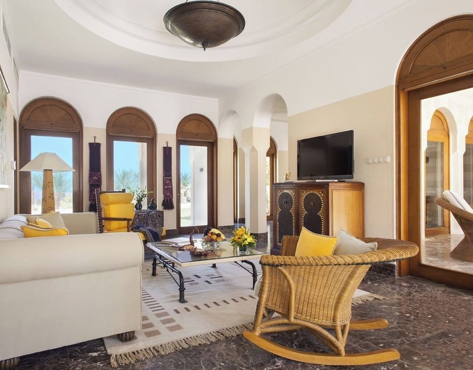 Royal Suite (with private pool) | Living area | 42-inch LED TV with satellite channels, TV, DVD player