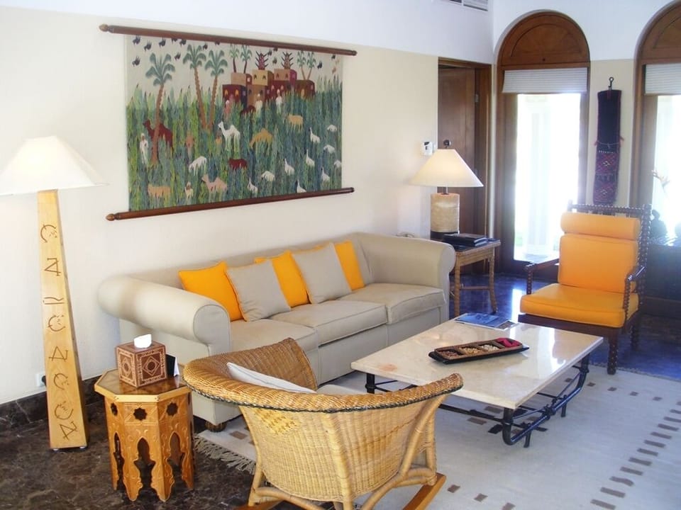 Royal Suite (with private pool) | Living area | 42-inch LED TV with satellite channels, TV, DVD player