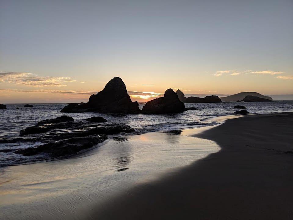 The beach at sunset.