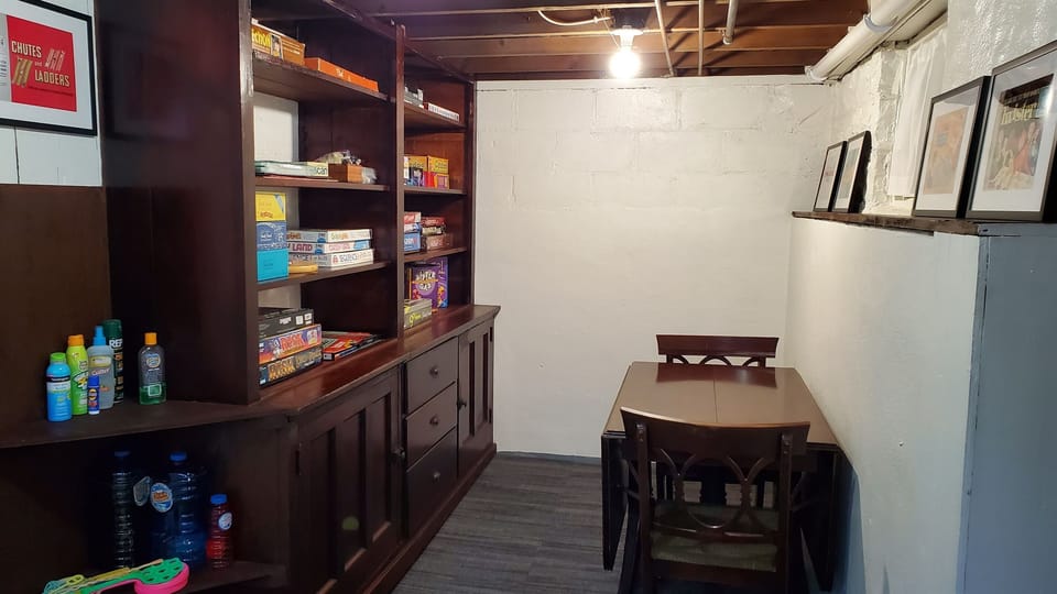 Send the kids downstairs for some game play with our 3 shelves of provided games and activities