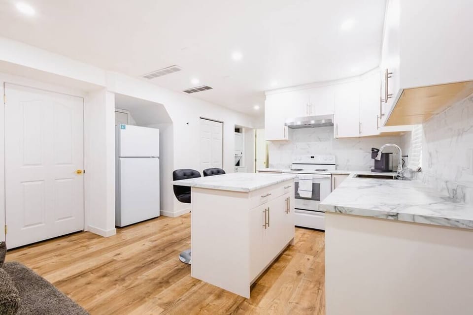 The kitchen island is there to host your delicious meals.