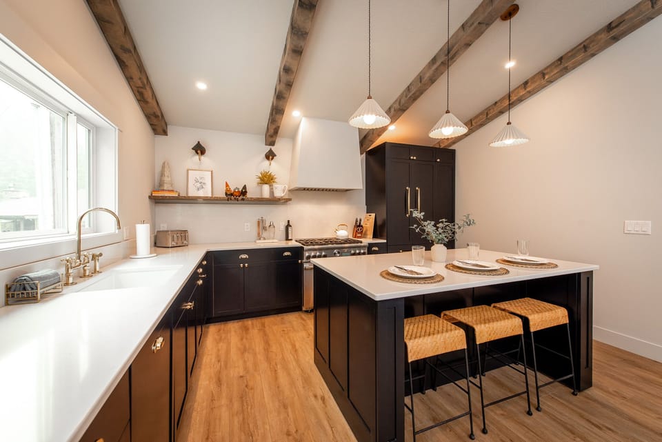 Custom kitchen with gas stove top, custom paneled fridge and dishwasher