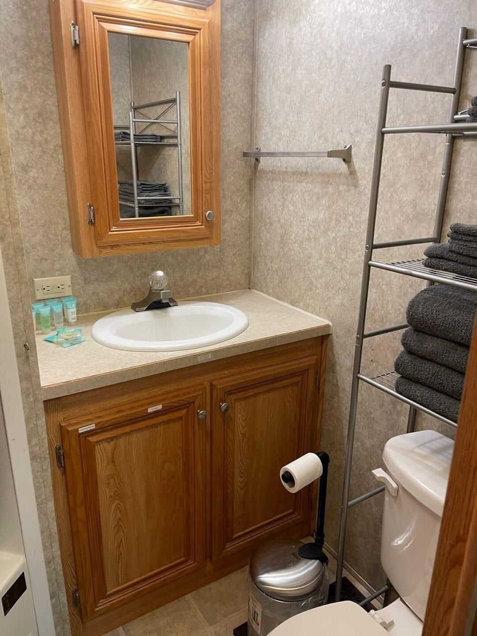 Bathroom stocked with towels, and toiletries