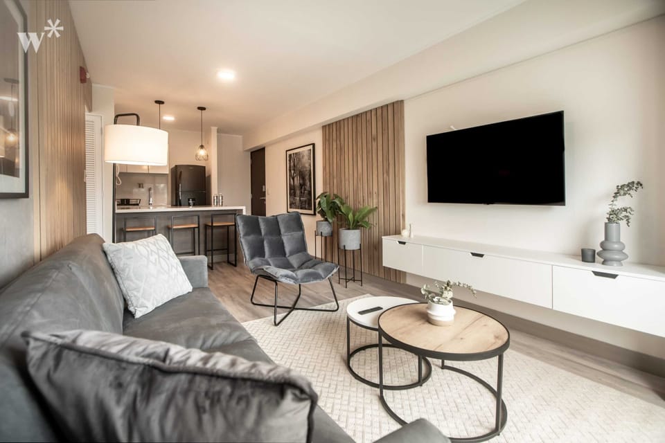 Apartment (902) | Living area | 40-inch Smart TV with cable channels