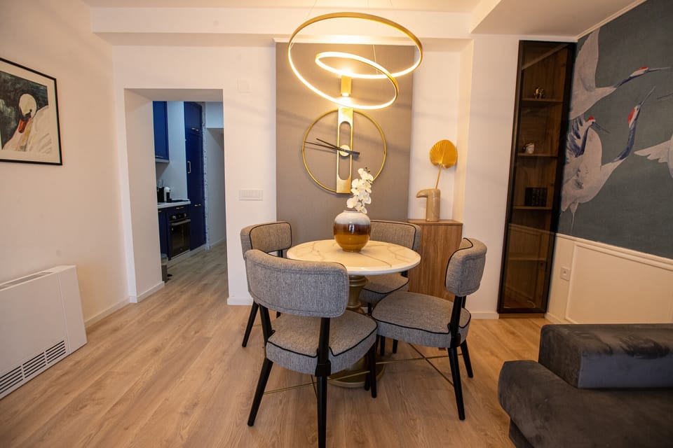 Luxury Apartment | Living area | 55-inch Smart TV with cable channels