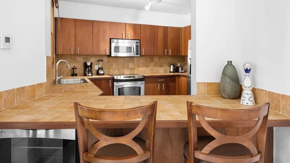 Kitchen boasts a bar-seating for two