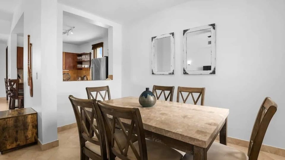 Dining area offers seating for six guests. 