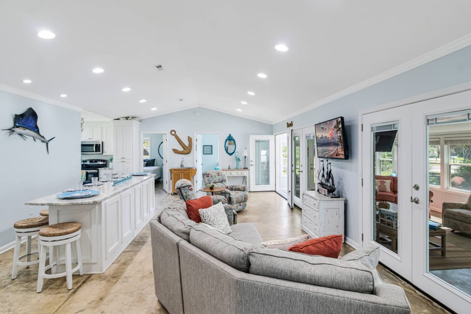 Looking the other direction, in the distance are 2 Bedrooms. The Bedroom on the Left has a King & on the Right, a Queen Bed.