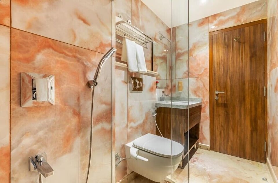 Shower, free toiletries, hair dryer, slippers