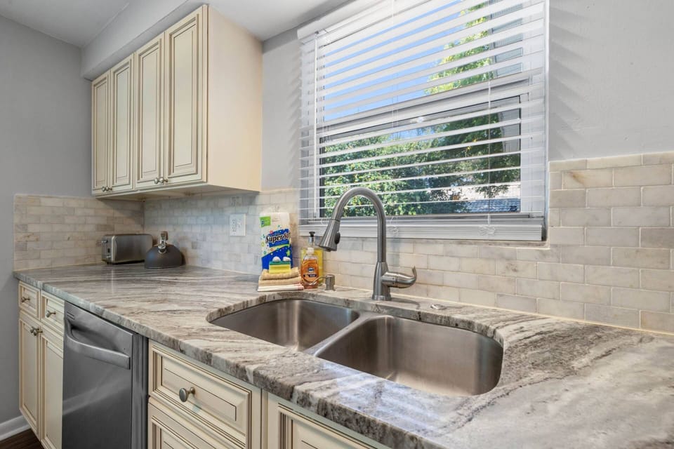 Updated Kitchen with Stainless Steel Appliances, Granite Countertops, and Soft Close Cabinets