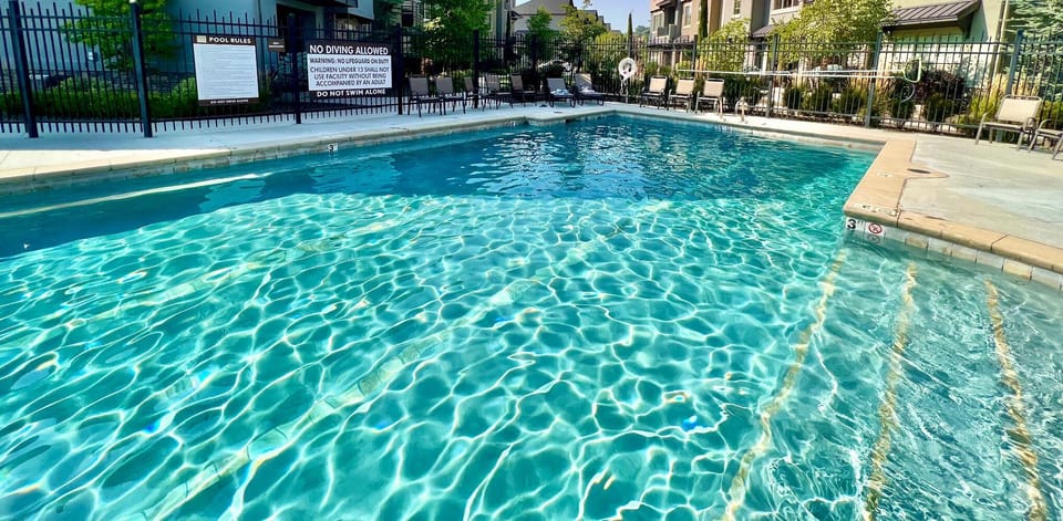Our home is steps away from the pool and you can see the pool from our windows.