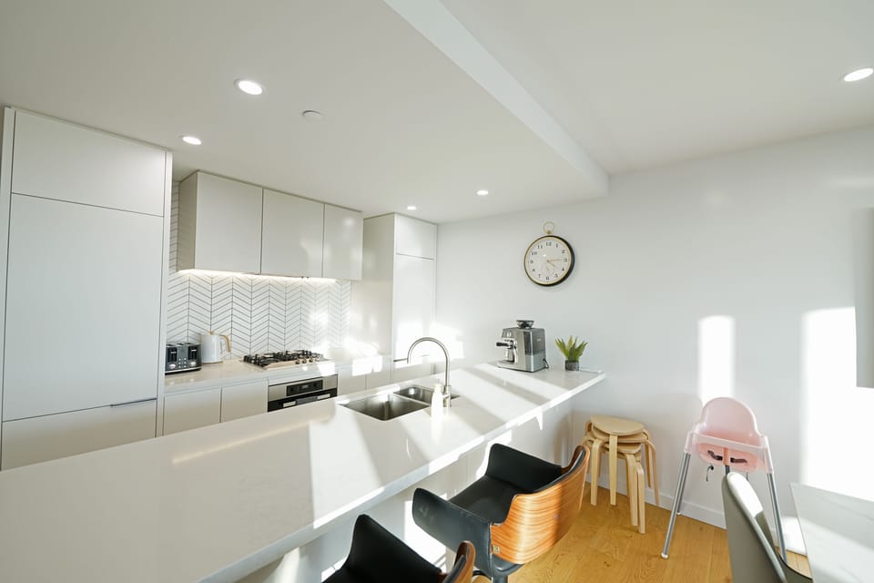 Elite Apartment | Private kitchen | Microwave, highchair