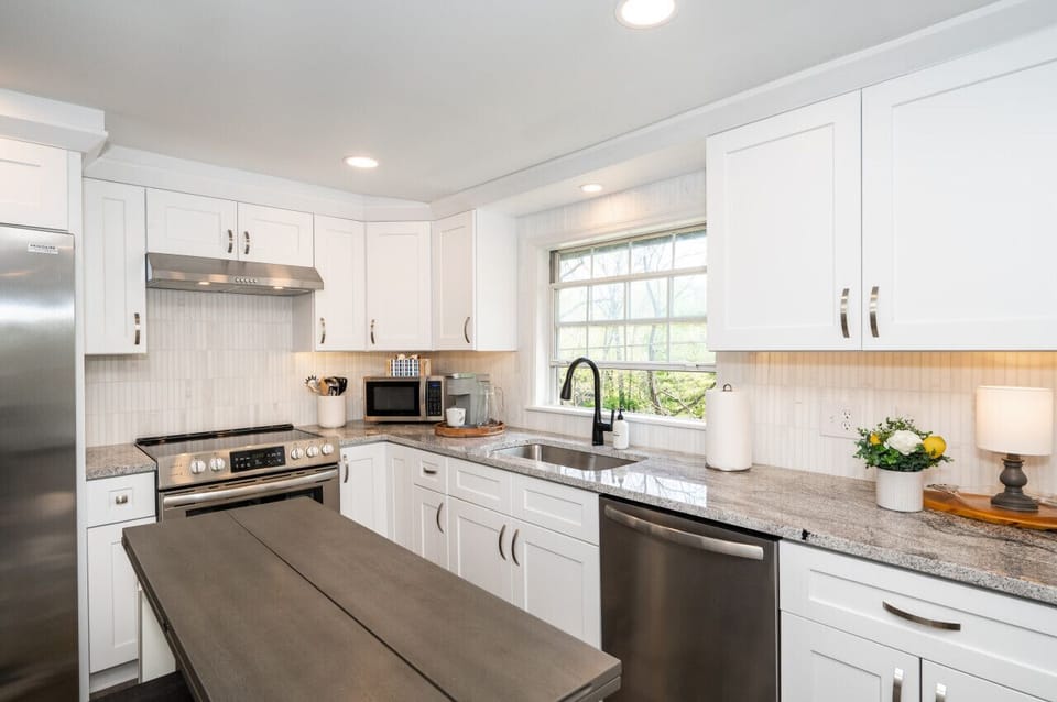 fully stocked kitchen - dishware, glassware, cookware