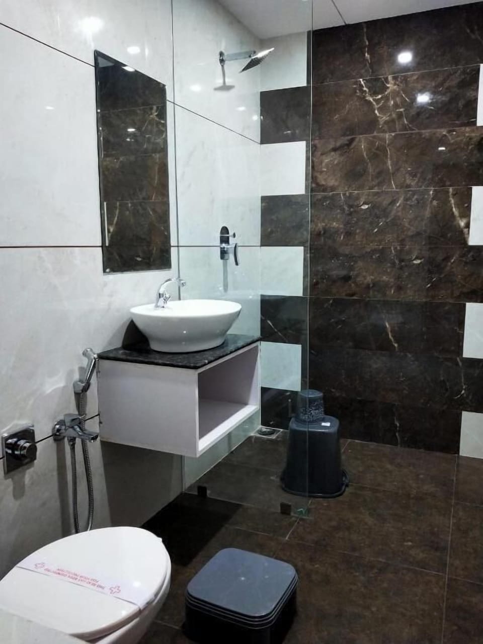 Separate tub and shower, rainfall showerhead, free toiletries