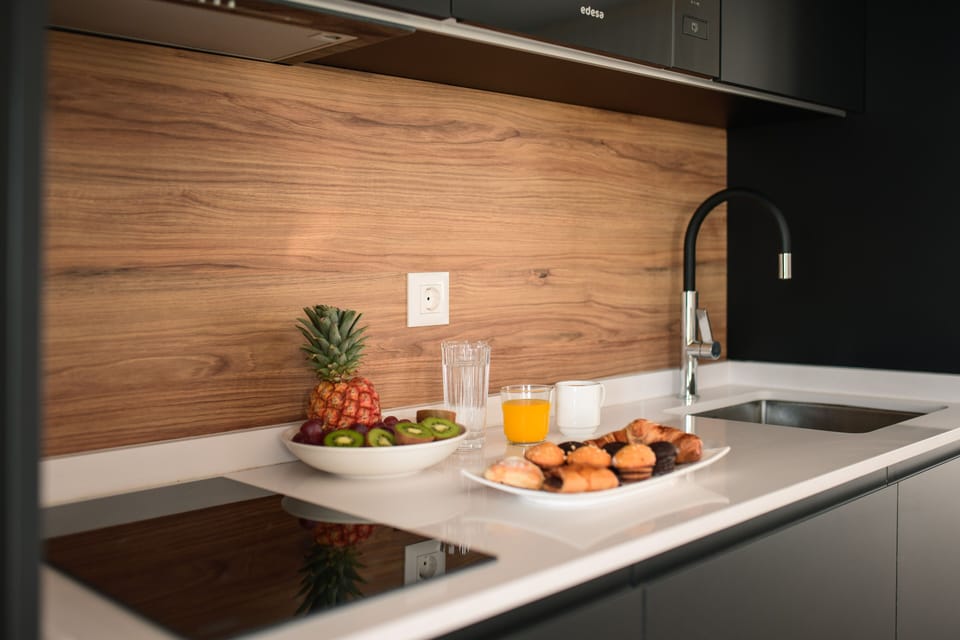 Mini-fridge, microwave, stovetop, cookware/dishes/utensils