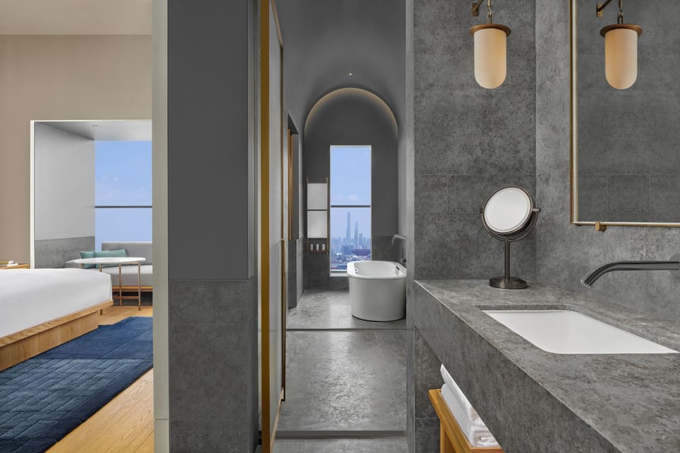 Separate tub and shower, hair dryer, bathrobes, slippers