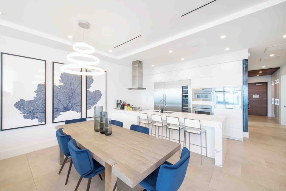 The formal dining table seats 6. The balcony dining table also seats 6.