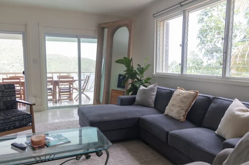 Comfortable seating in the spacious and well lit living room