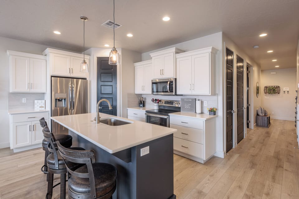 Kitchen Side View - Discover the heart of the home in the meticulously designed kitchen, where modern functionality meets timeless elegance.