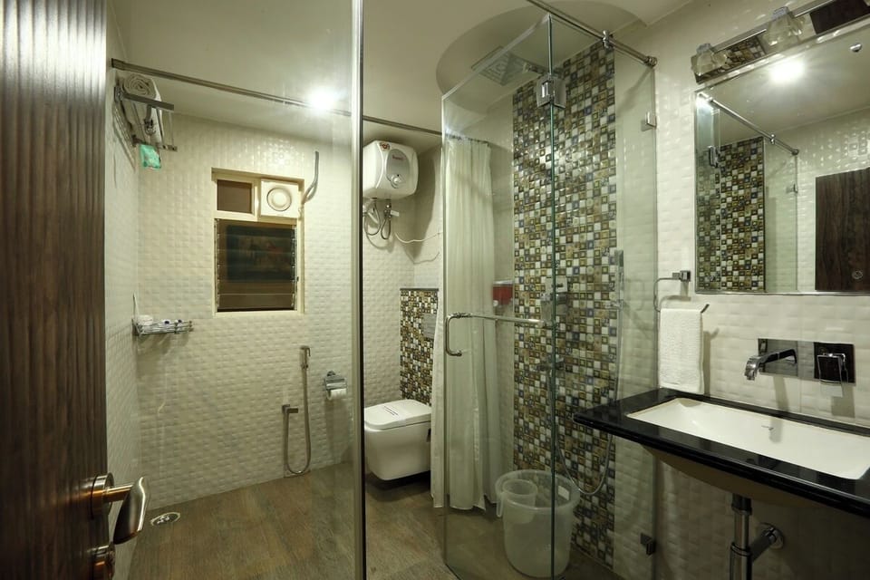 Shower, rainfall showerhead, towels