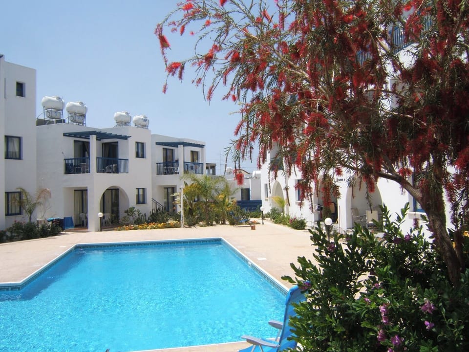 Relax by the pool private sunbeds and beach chairs provided