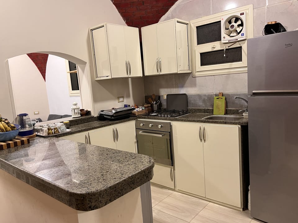 Studio with a Garden View | Private kitchen | Shared fridge, microwave, coffee/tea maker, electric kettle