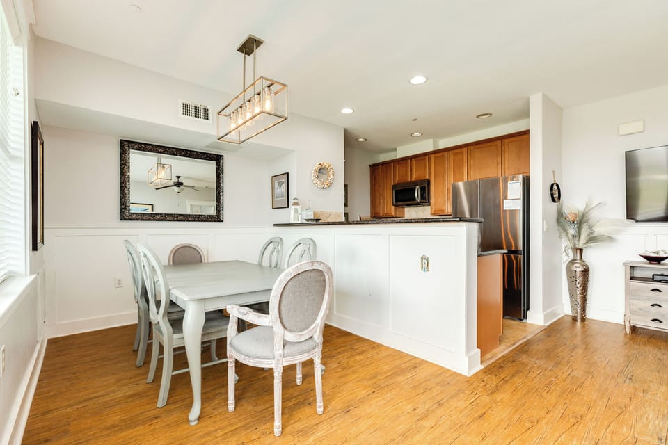 Easily serve meals from the adjacent kitchen