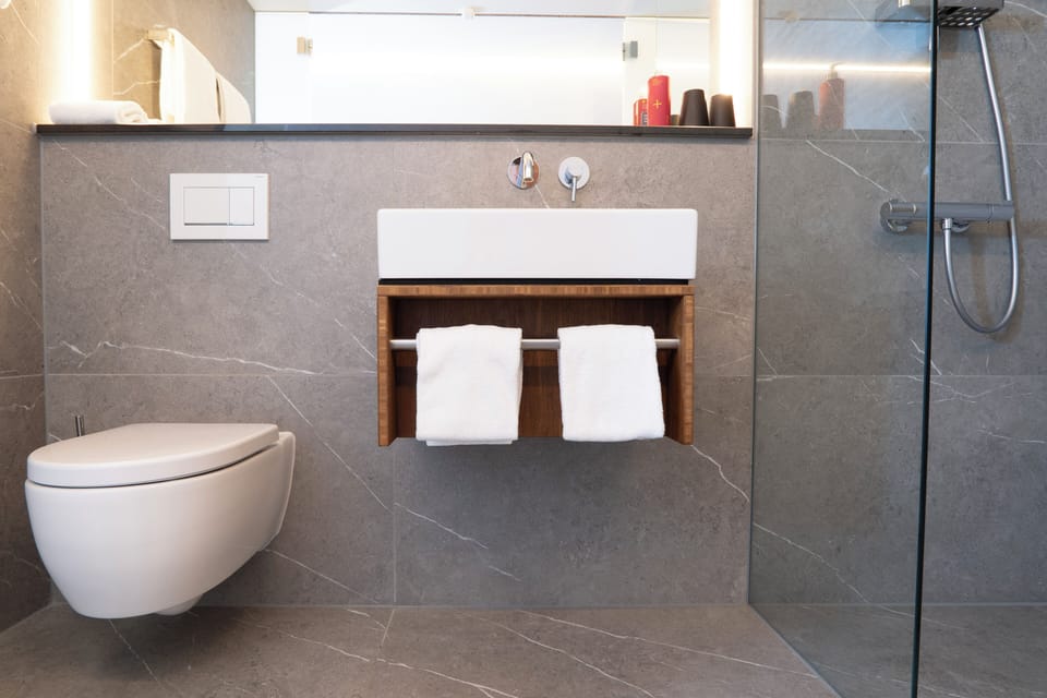 Comfort Double Room, Non Smoking, Refrigerator | Bathroom | Shower, hair dryer, heated floors, towels