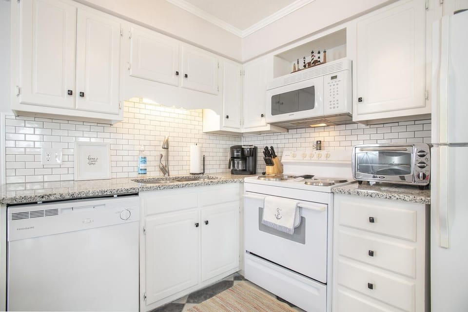 Condo, 2 Bedrooms | Private kitchen | Coffee/tea maker, fridge, oven, toaster