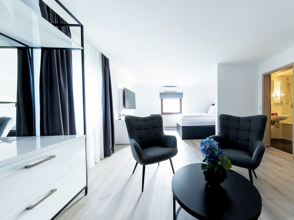 Junior Studio Suite | Free minibar, individually furnished, desk, blackout drapes